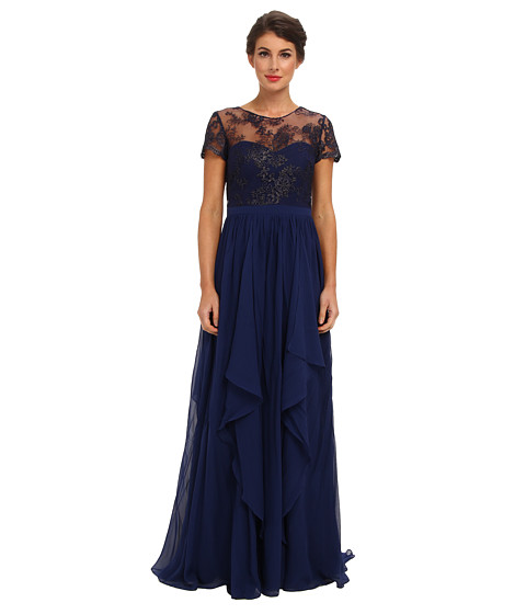 Rochie de lux eleganta Badgley Mischka. Mark Badgley si James Mischka au creat un adevarat imperiu datorita creatiilor de rochii de lux pline de feminitate si eleganta Badgley Mischka. Croielile extraordinar de fine dar luxuriante, accesoriile, voalurile ce unduiesc rochiile de seara Badgley Mischka impresioneaza nu doar pe covoarele rosii de la Hollywood sau la New York, Paris, Londra, Tokio sau Milano Fashion Weeks ce la fiecare eveniment special la care o femeie eleganta ia parte purtand eticheta acestor designeri exclusivisti, pentru care luxurianta lume a modei poate fi abordata de catre consumatorul mediu.