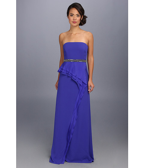 Rochie de ocazie Badgley Mischka Strapless Tiered Gown. Stilul colectiilor Badgley Mischka aminteste de Hollywood-ul plin de farmec al anilor patruzeci, stilul creatiilor Badgley Mischka fiind simplificat dar extraordinar de elegant. Rochile de seara si ocazie Badgley Mischka sunt lucrate din cele mai fine tesaturi de catre adevarati artisti, maestrii ai tesaturilor ce reusesc prin fiecare noua colectie, sezon de sezon, sa defineasca exclusivismul fie prin croiala rochiei fie prin detaliile si accesoriile de lux.
