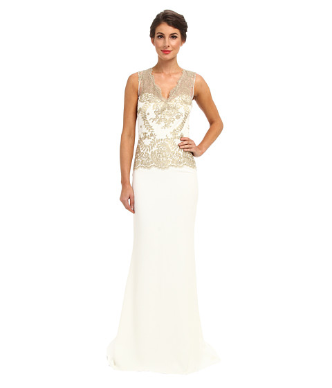 Rochie eleganta Ivory Gold Badgley Mischka. Marca exclusivista de lux pentru femei Badgley Mischka poarta numele a doi designeri new york-ezi, Mark Badgley si James Mischka. Acestia s-au cunoscut in cadrul Scolii de Design Parsons din New York si au realizat imediat ca impartasesc o viziune creativa comuna - astfel ca, in anul 1988, Mark si James au lansat prima colectie in colaborare: Badgley Mischka. Aceasta a fost primita cu entuziasm de lumea modei, criticii apreciind designul unic al confectiilor si perechilor de incaltaminte proiectate de cei doi.