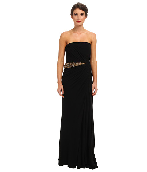 Rochie neagra eleganta Badgley Mischka Solid Draped Jersey. Stilul colectiilor Badgley Mischka aminteste de Hollywood-ul plin de farmec al anilor patruzeci, stilul creatiilor Badgley Mischka fiind simplificat dar extraordinar de elegant. Rochile de seara si ocazie Badgley Mischka sunt lucrate din cele mai fine tesaturi de catre adevarati artisti, maestrii ai tesaturilor ce reusesc prin fiecare noua colectie, sezon de sezon, sa defineasca exclusivismul fie prin croiala rochiei fie prin detaliile si accesoriile de lux.