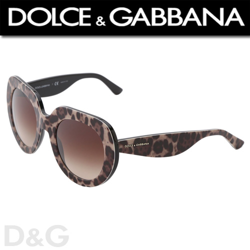 Ochelari Animal Print Dolce & Gabbana model DG4191P D&G au contribuit intotdeauna la lumea modei prin modele de culori remarcabile dar si prin stilul impus de acestea. Cei doi designeri italieni au muncit din greu sa isi ridice numele pe cele mai inalte culmi, devenind astazi unul dintre cele mai apreciate branduri din lumea modei. Iubit de nume mari din intreaga lume precum Madonna, Sophia Loren sau familia Beckham, Madonna are chiar propria colectie de soare creata de celebra casa de moda.  Design-ul lor avansat cu un maxim de confort fac ca ochelarii de soare sa fie usor de asortat si in acelasi timp cu un look incredibil! Fii fermecatoare, plina de culoare si eleganta! Devenind un o eticheta a brandului, animal printul a dat tonul pentru colectia primavara-vara de ochelari de soare Dolce e Gabbana.