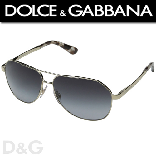 Dolce & Gabbana 0DG2144 Pale Gold/Grey Gradient Este imposibil sa ne imaginam o viata fara vise, aceasta este filozofia designerilor Dolce&Gabbana. Domenico Dolce si Stefano Gabbana au lansat prima colectie de haine pentru femei in 1995  atunci s-a nascut brandul. In 1996 au lansat prima lor colectie de ochelari. Ochelarii au un design deosebit si rafinat, sunt fabricati din materiale pretioase cu aplicatii de cristale fine.