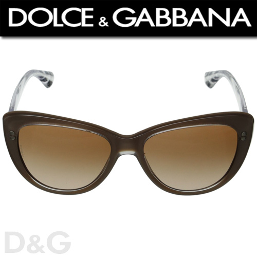 Dolce & Gabbana DG4221 Crystal Sand/Brown Gradient D&G au contribuit intotdeauna la lumea modei prin modele de culori remarcabile dar si prin stilul impus de acestea. Cei doi designeri italieni au muncit din greu sa isi ridice numele pe cele mai inalte culmi, devenind astazi unul dintre cele mai apreciate branduri din lumea modei. Iubit de nume mari din intreaga lume precum Madonna, Sophia Loren sau familia Beckham, Madonna are chiar propria colectie de soare creata de celebra casa de moda.  Design-ul lor avansat cu un maxim de confort fac ca ochelarii de soare sa fie usor de asortat si in acelasi timp cu un look incredibil! Fii fermecatoare, plina de culoare si eleganta! Devenind un o eticheta a brandului, animal printul a dat tonul pentru colectia primavara-vara de ochelari de soare Dolce e Gabbana.